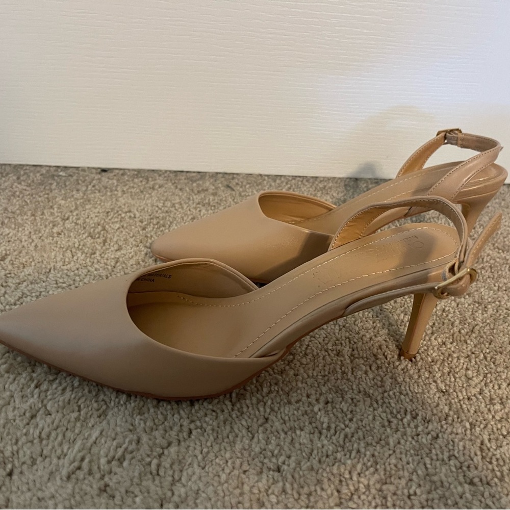 Women’s tan sling back heels.  Used but only worn one time.  Good condition.